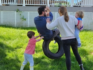 Hull-O Farms Family on Tire Swing