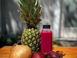 Juice bottle and fruit