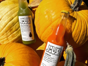 Juice bottles and pumpkins