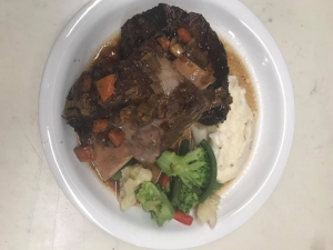 Meat, broccoli and mashed potatoes