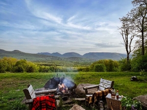 Chairs by the fire outside