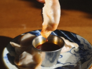 dipping a dumpling