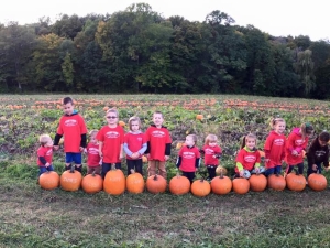 Kids and pumpkins in the fall